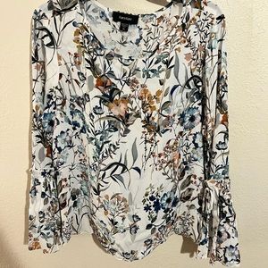 Really pretty close with bell sleeves